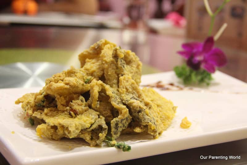 Savour mouth-watering Zi Char dishes in a new-age environment at Guan Kitchen